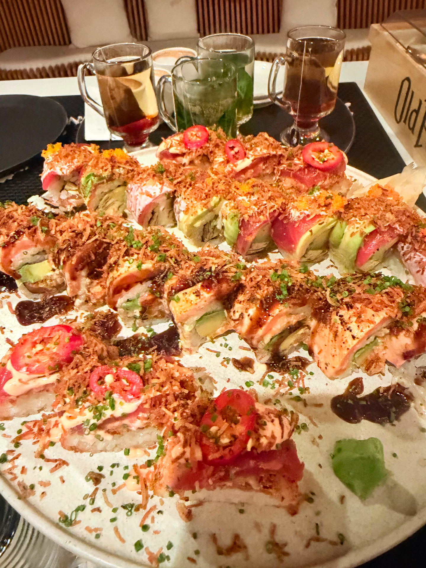 Torched signature rolls dressed with chilli and crispy shallots